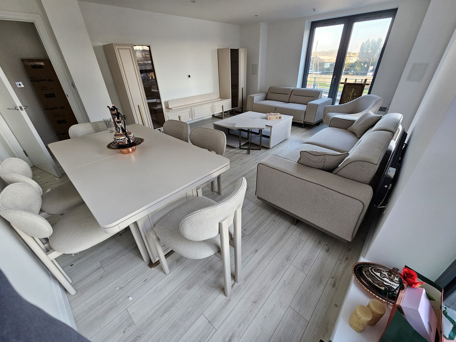 Coordinated living and dining furniture installed in a real customer home